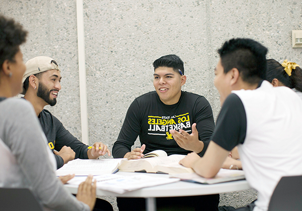 Students meeting in their peer group