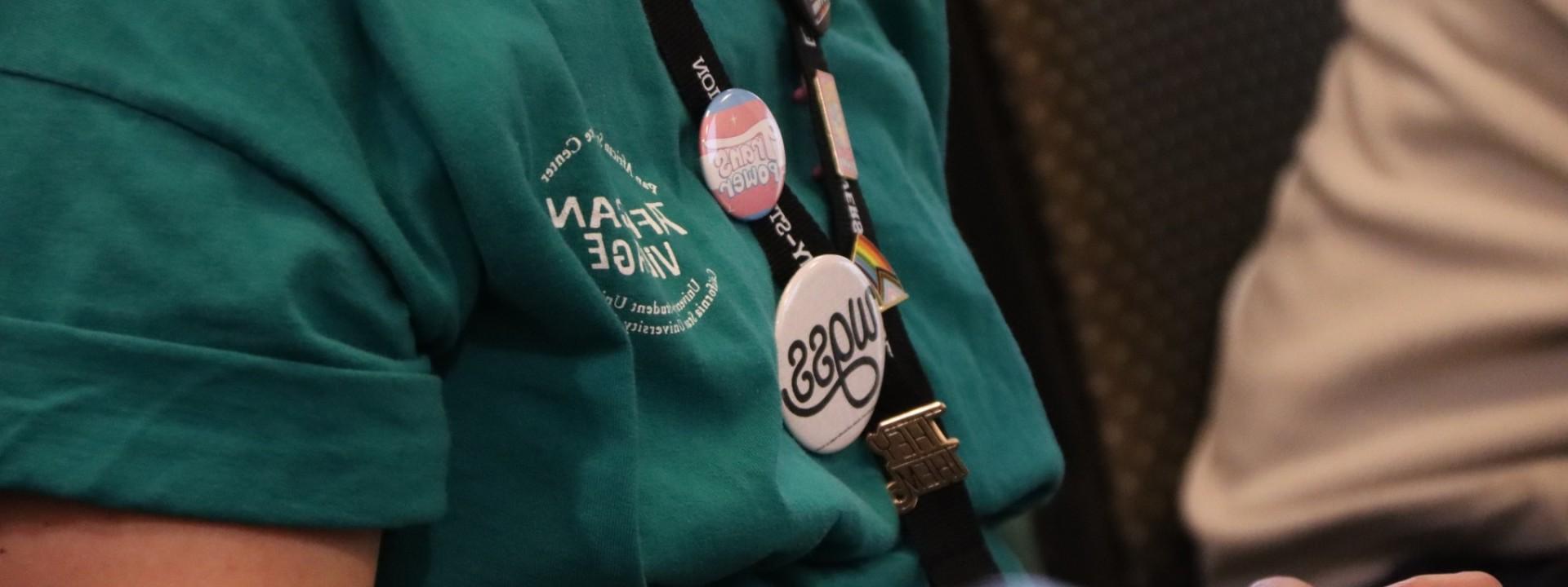 Student with WGSS Pins on a lanyard